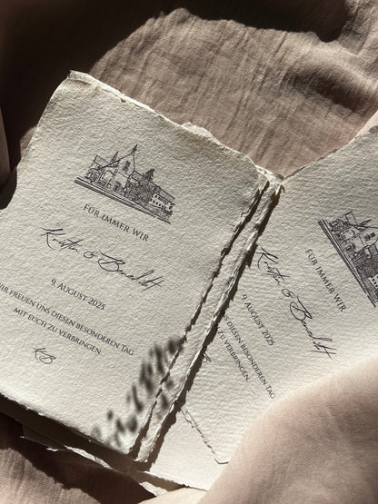 Hochzeitseinladung mit individueller Location-Zeichnung auf Büttenpapier

Handgezeichnete Skizze Hochzeitslocation – Einladung auf Baumwollpapier

Ort der Ewigkeit – romantische Einladung mit feiner Illustration