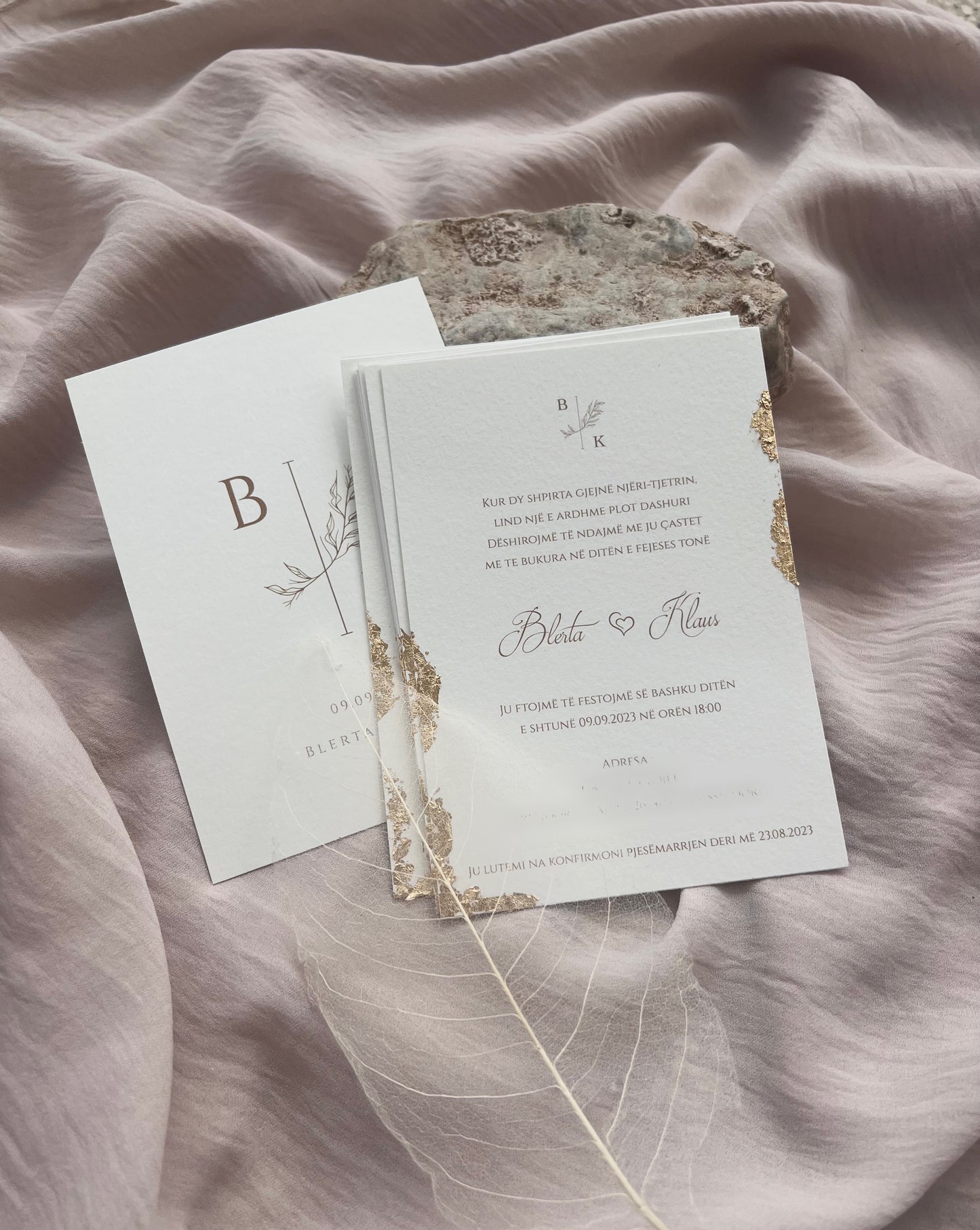 Gorgeous invitations with gold leaf